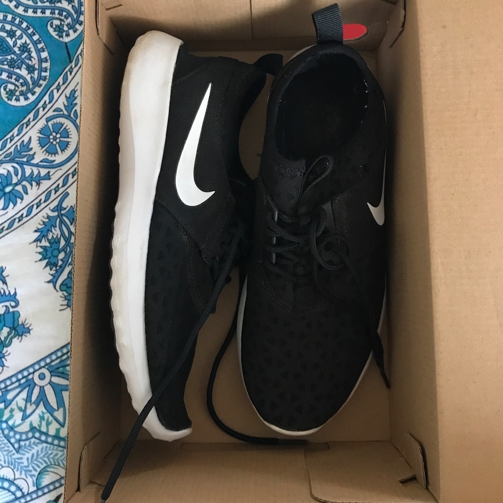 Nike black juvenate sneakers